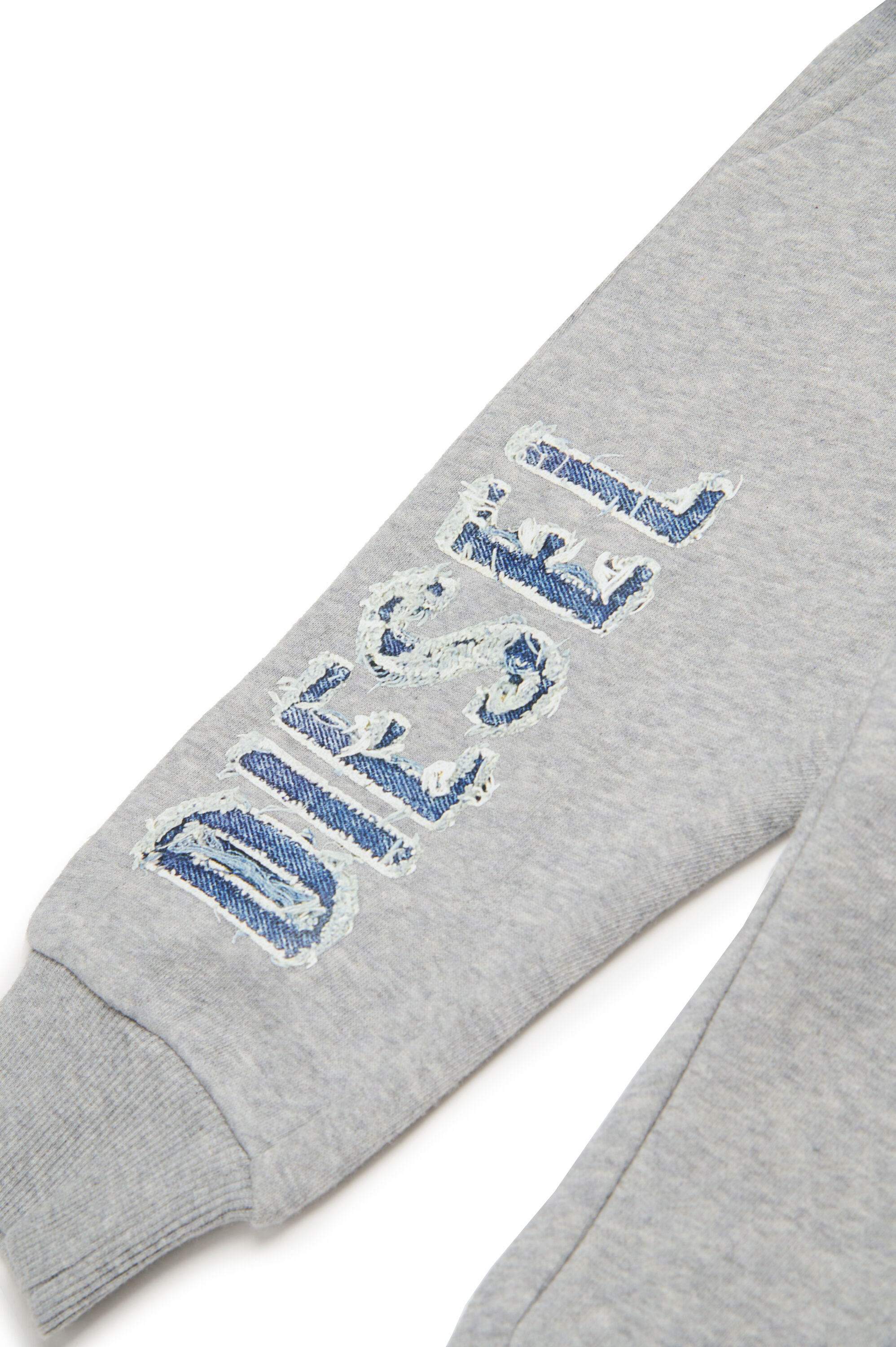 Diesel - PGIBBIB, Pantaloni tuta con logo in denim sfrangiato Uomo in Grigio - 4