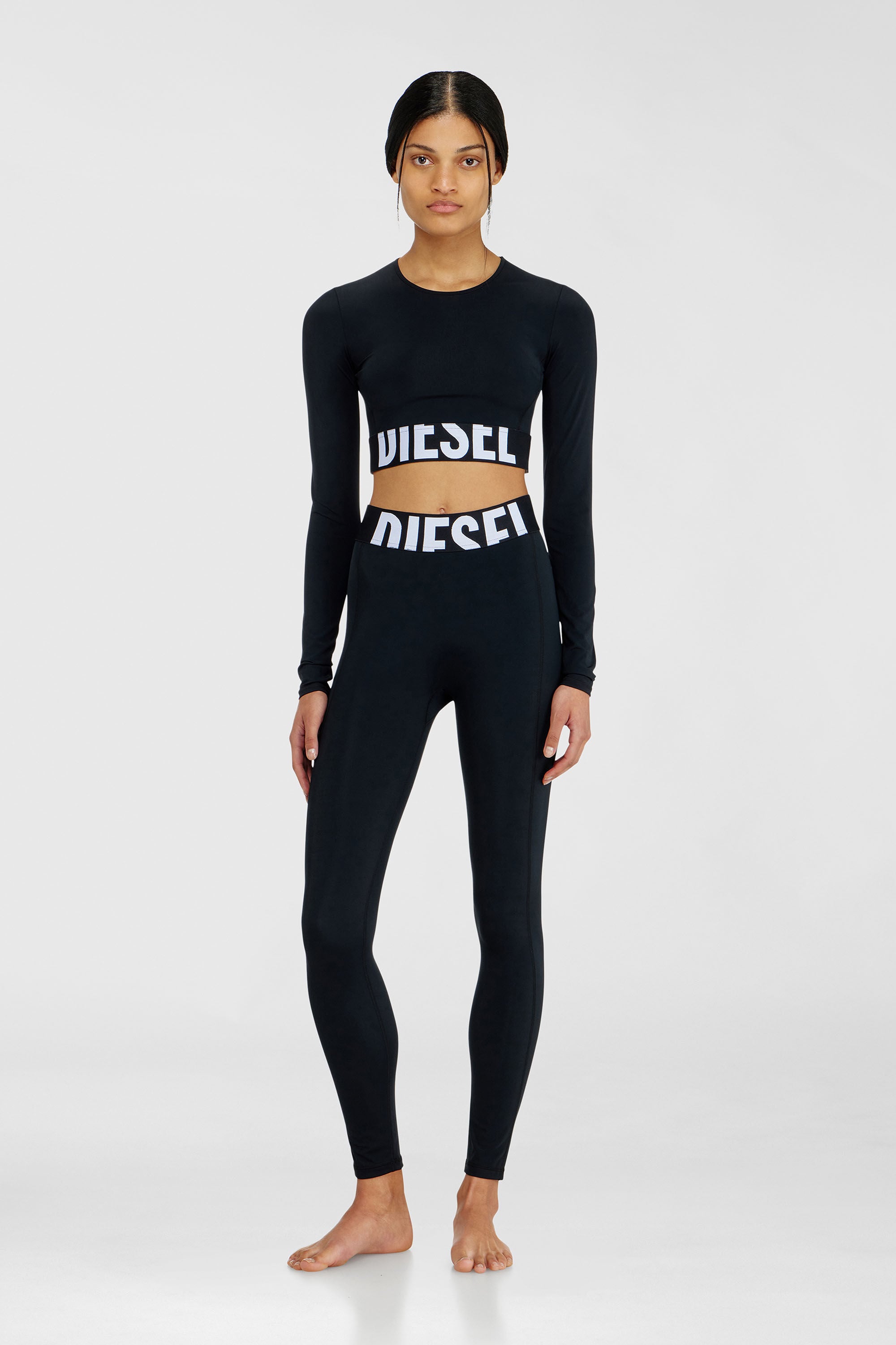 Diesel - ADELINE-D-POP, Leggings in microfibra con logo tagliato Donna in Nero - 1