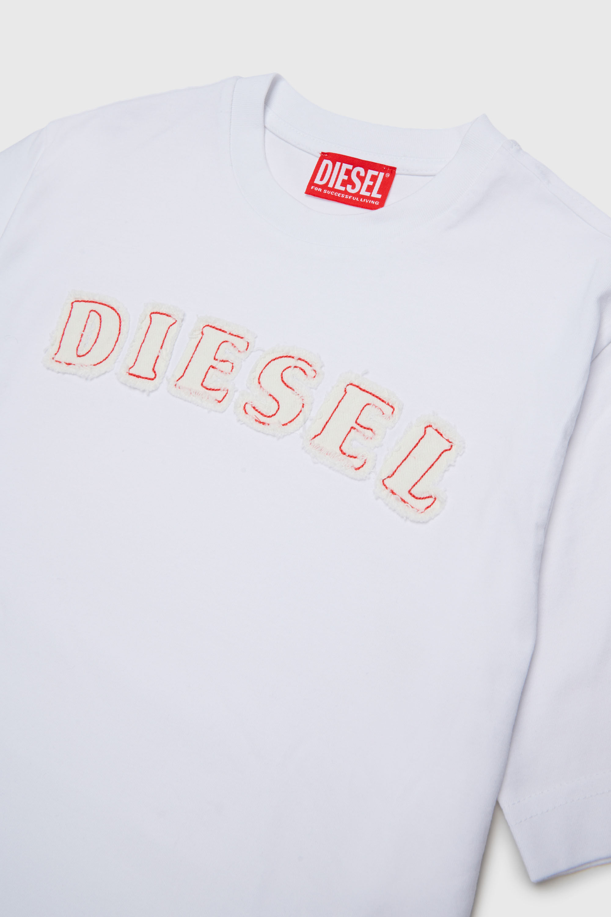 Diesel - TJEANS OVER, T-shirt in cotone con logo effetto sfrangiato Uomo in Bianco - 3
