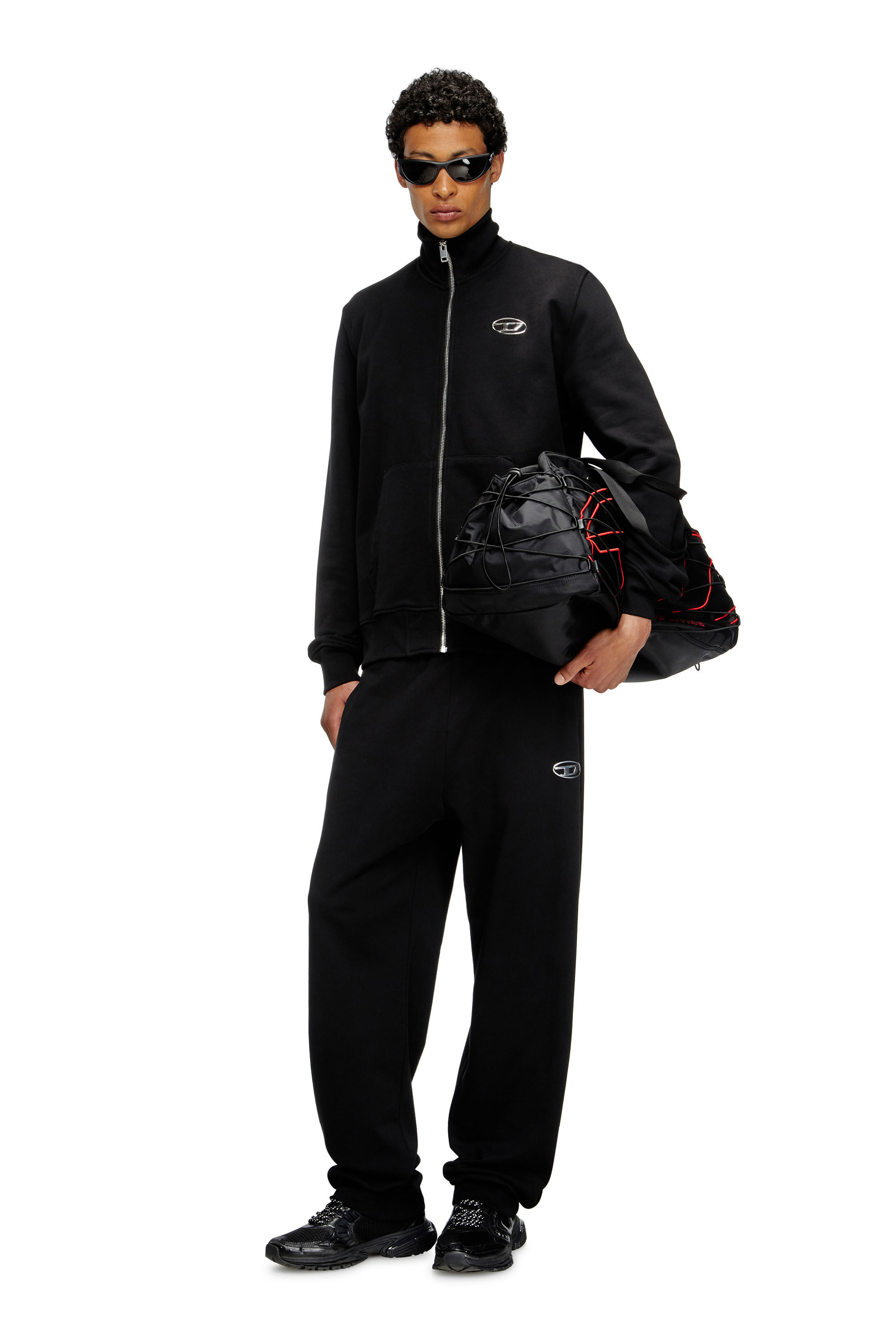 Diesel - P-MARKY-OD, Pantaloni tuta con Oval D metallizzato Uomo in Nero - 1