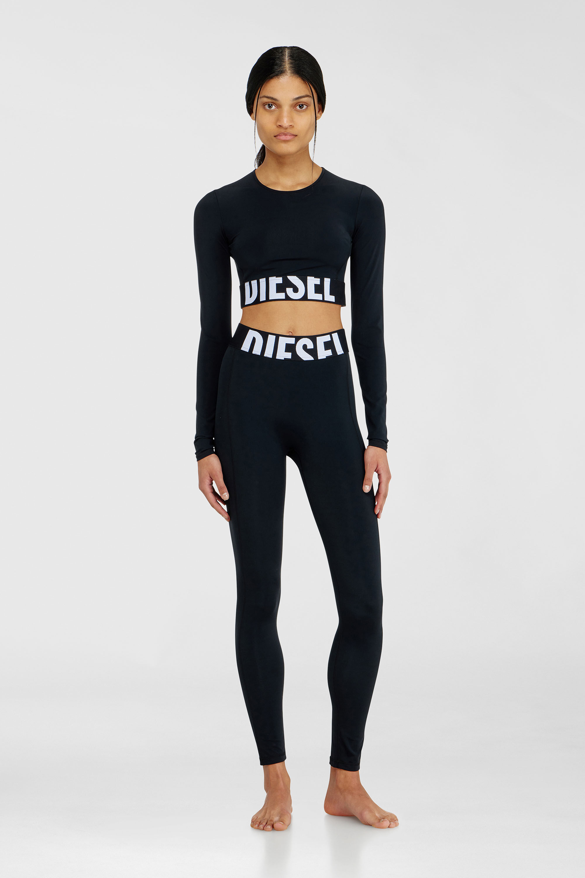 Diesel - MELISSA-D-POP, Crop top in microfibra con logo tagliato Donna in Nero - 1