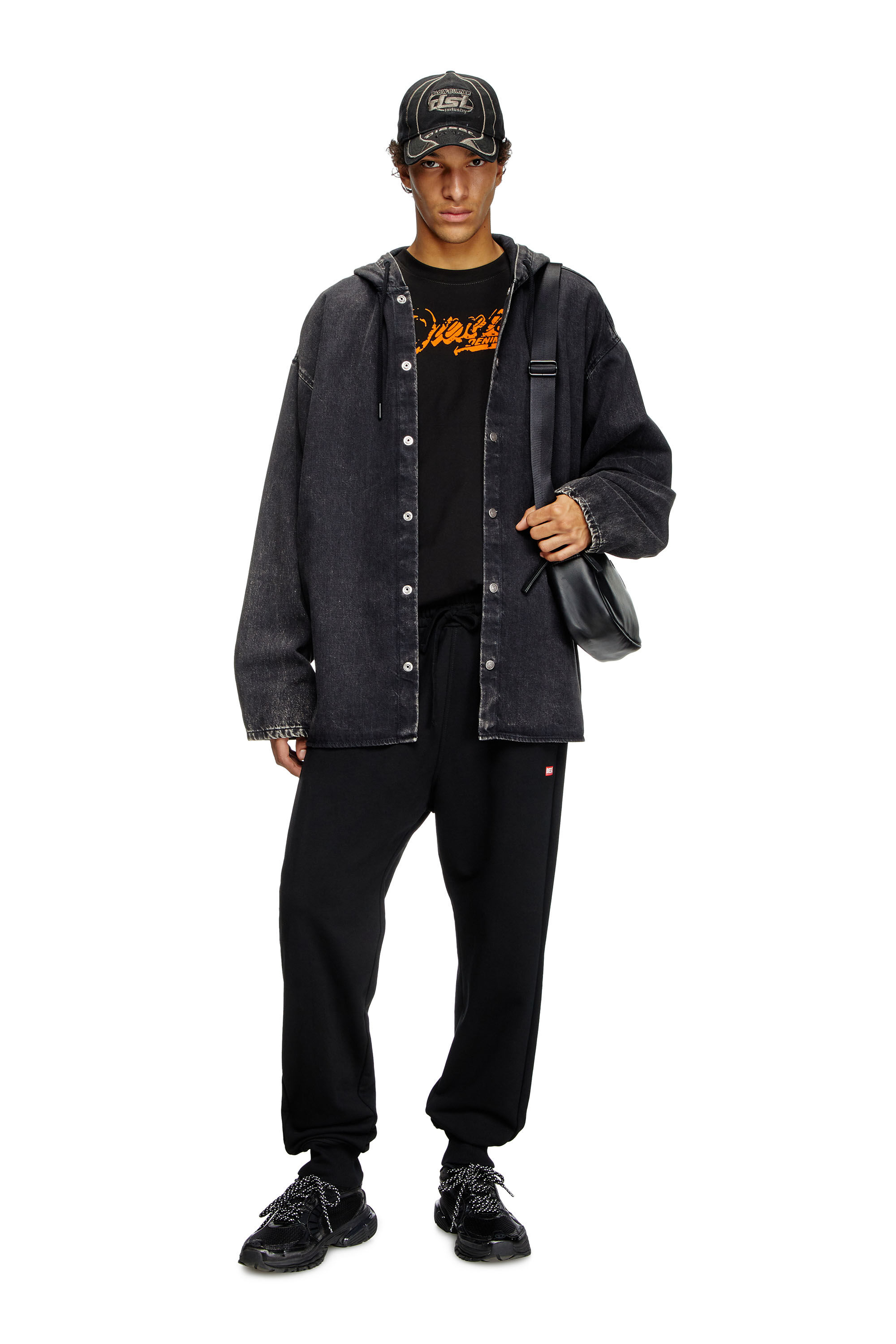 Diesel - T-ADJUST-R7, T-shirt con stampa distressed floccata Uomo in Nero - 1