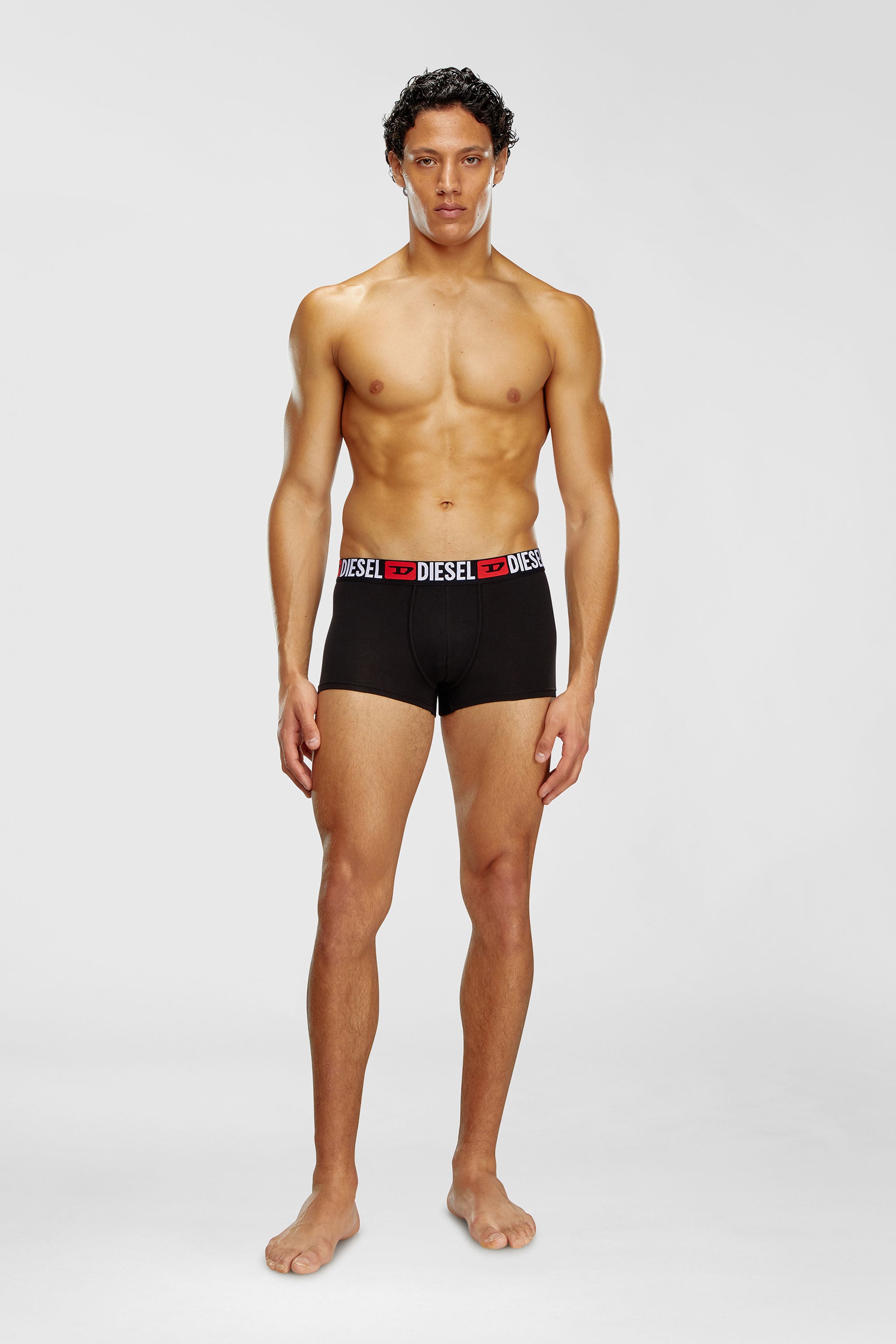 Diesel - UMBX-DAMIENTHREEPACK, Set da tre boxer con elastico in vita con logo all-over Uomo in Nero - 1