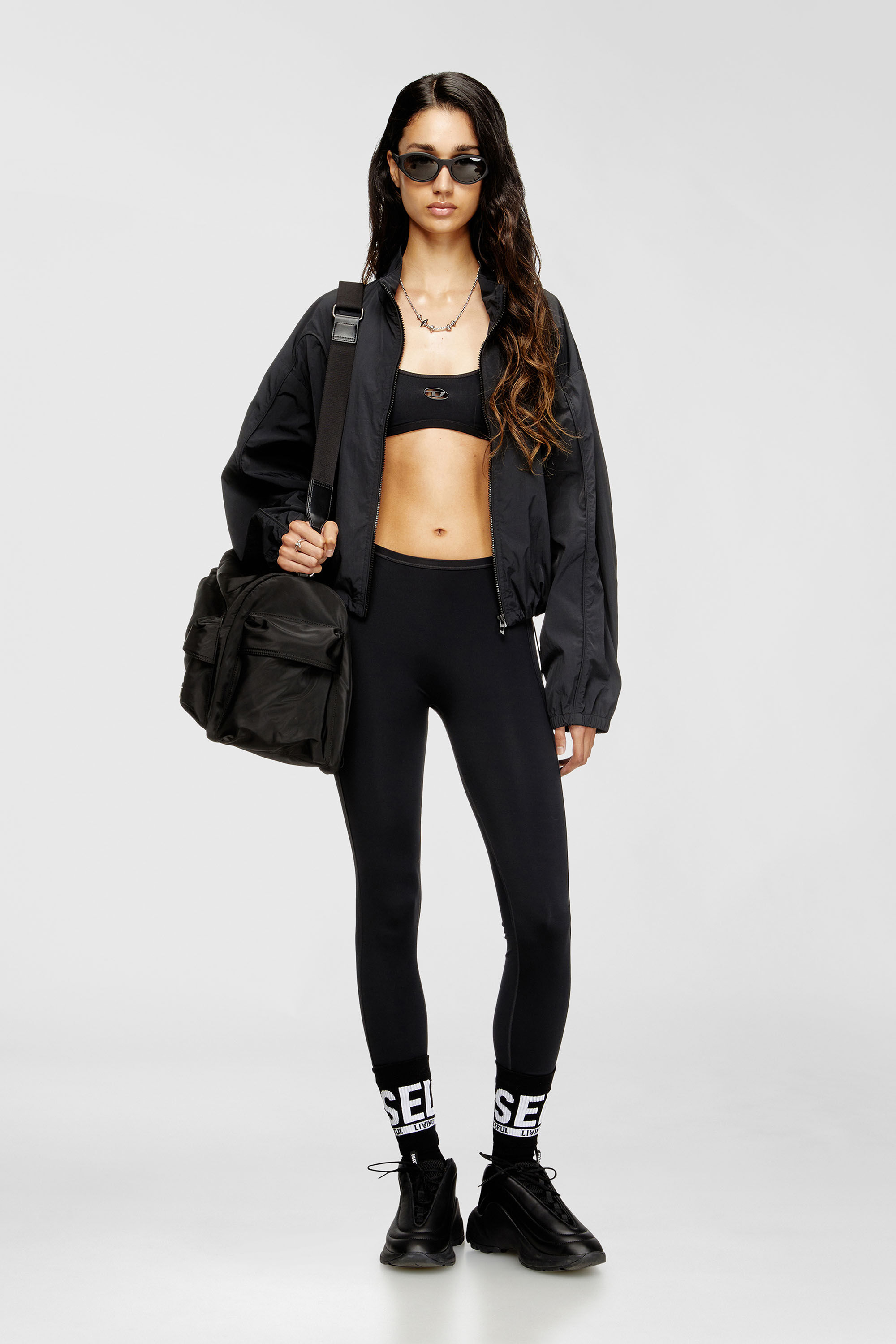 Diesel - CHELSEA-UTLT, Reggiseno sportivo con logo cut-out Donna in Nero - 6