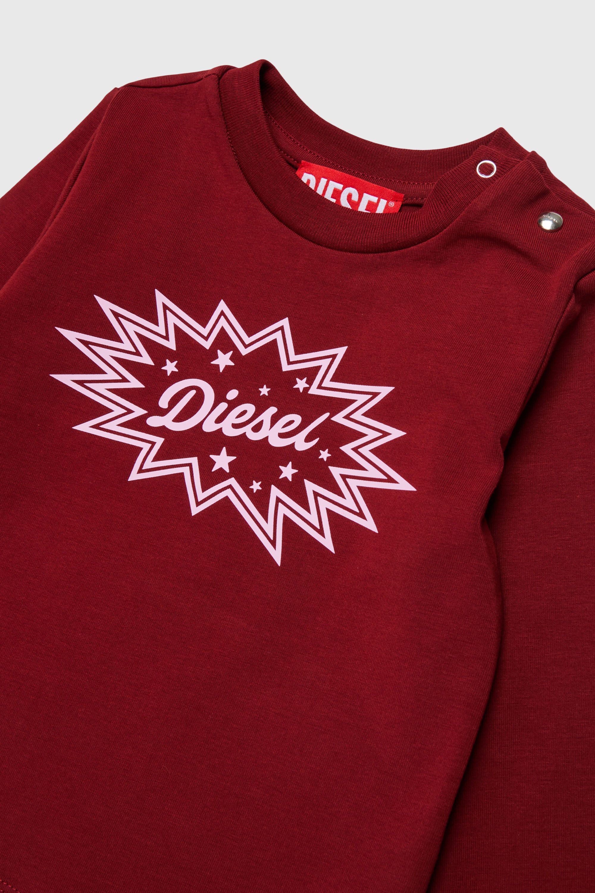 Diesel - TFUMB, T-shirt a manica lunga con stampa logo starburst Donna in Rosso - 3