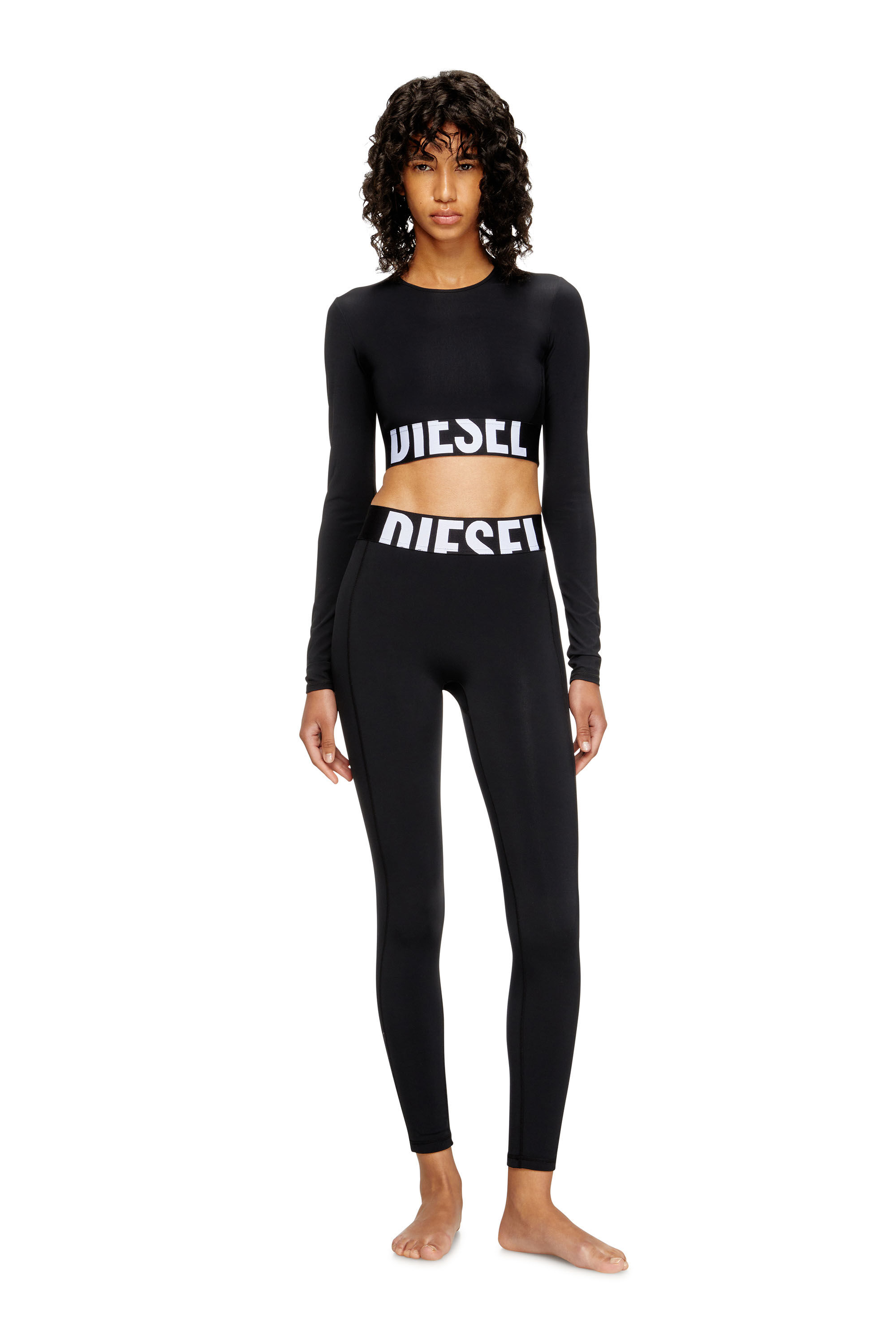 Diesel - ADELINE-D-POP, Leggings in microfibra con logo tagliato Donna in Nero - 1