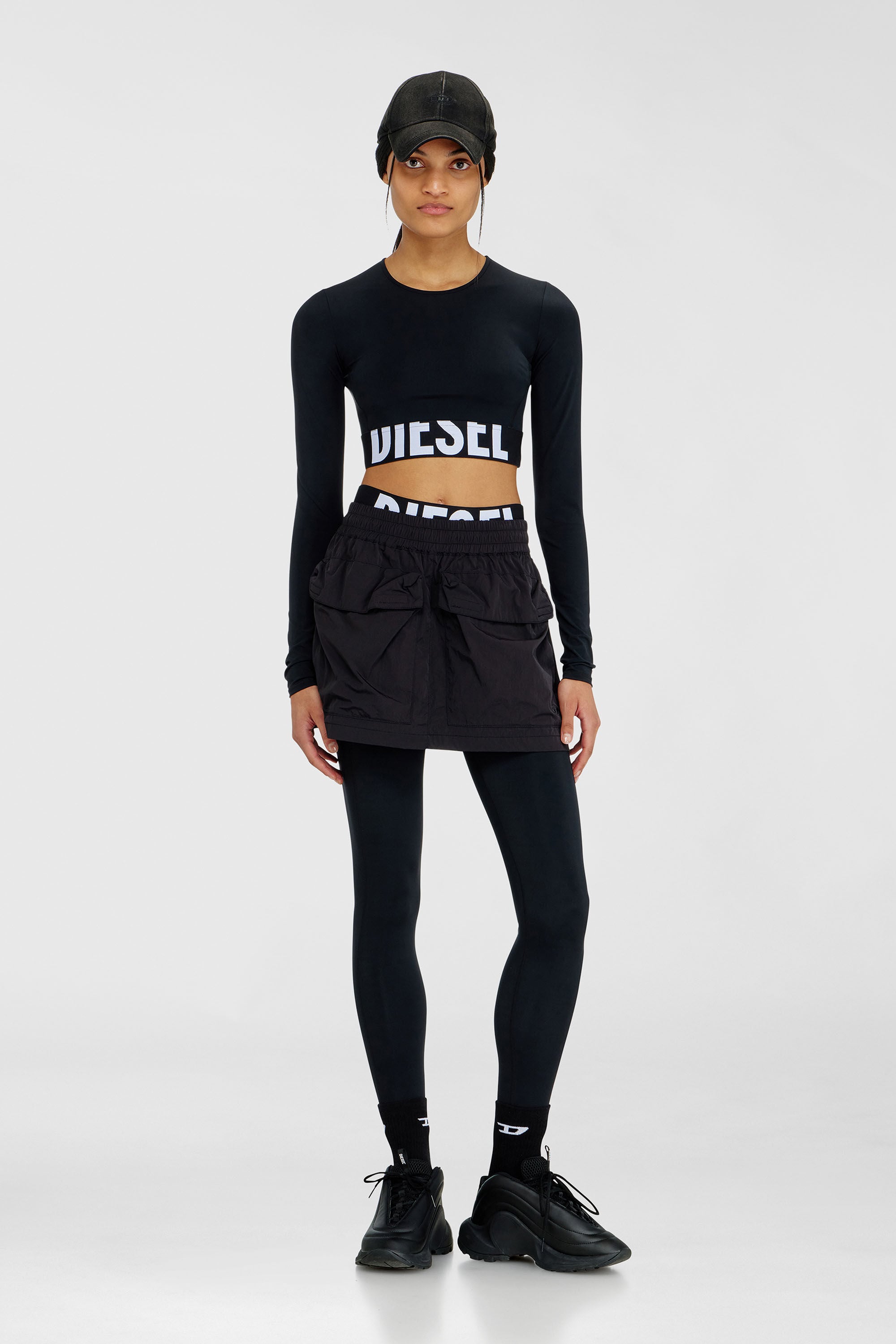 Diesel - ADELINE-D-POP, Leggings in microfibra con logo tagliato Donna in Nero - 5