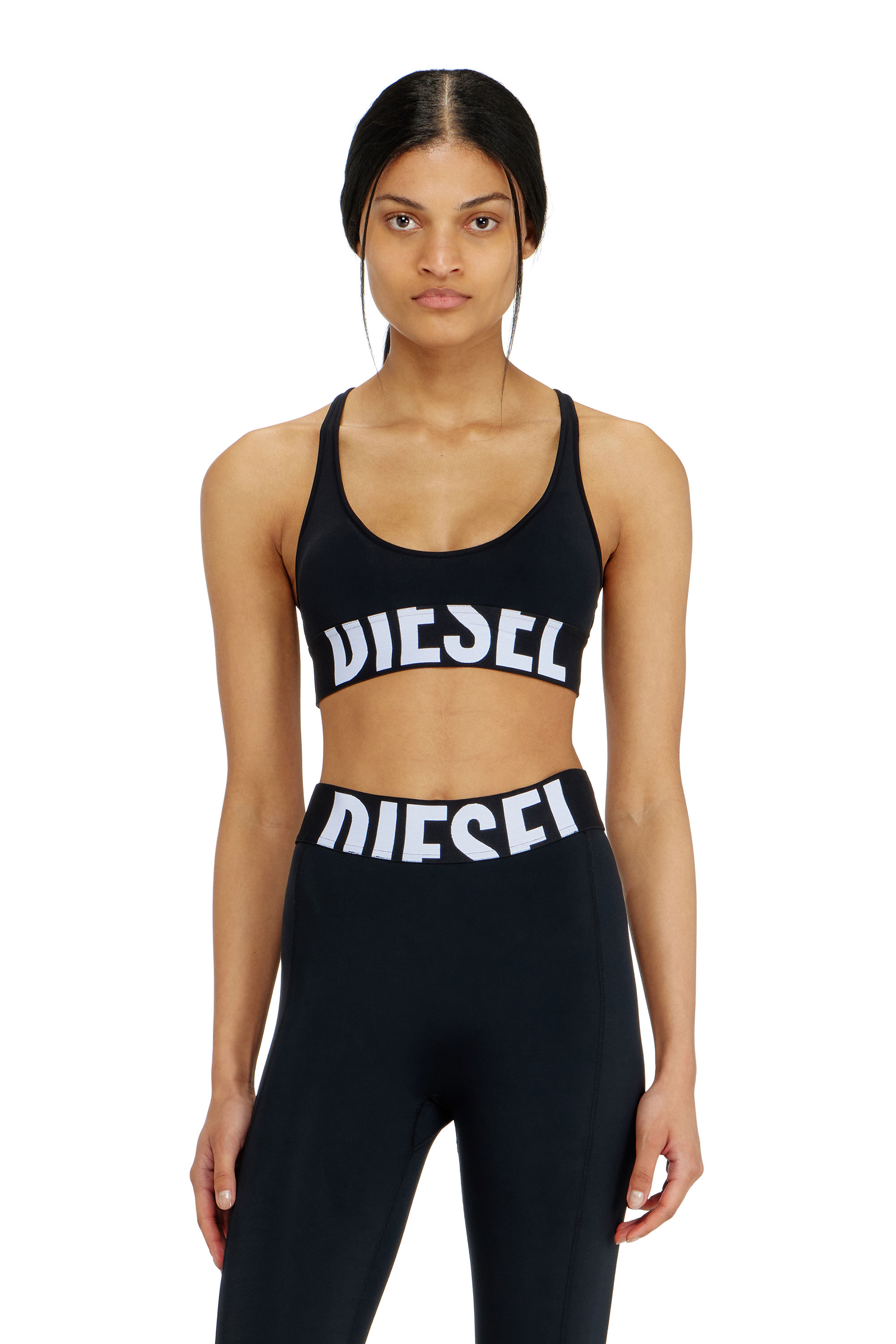 Diesel - ALLISON-D-POP, Reggiseno sportivo con logo tagliato Donna in Nero - 1