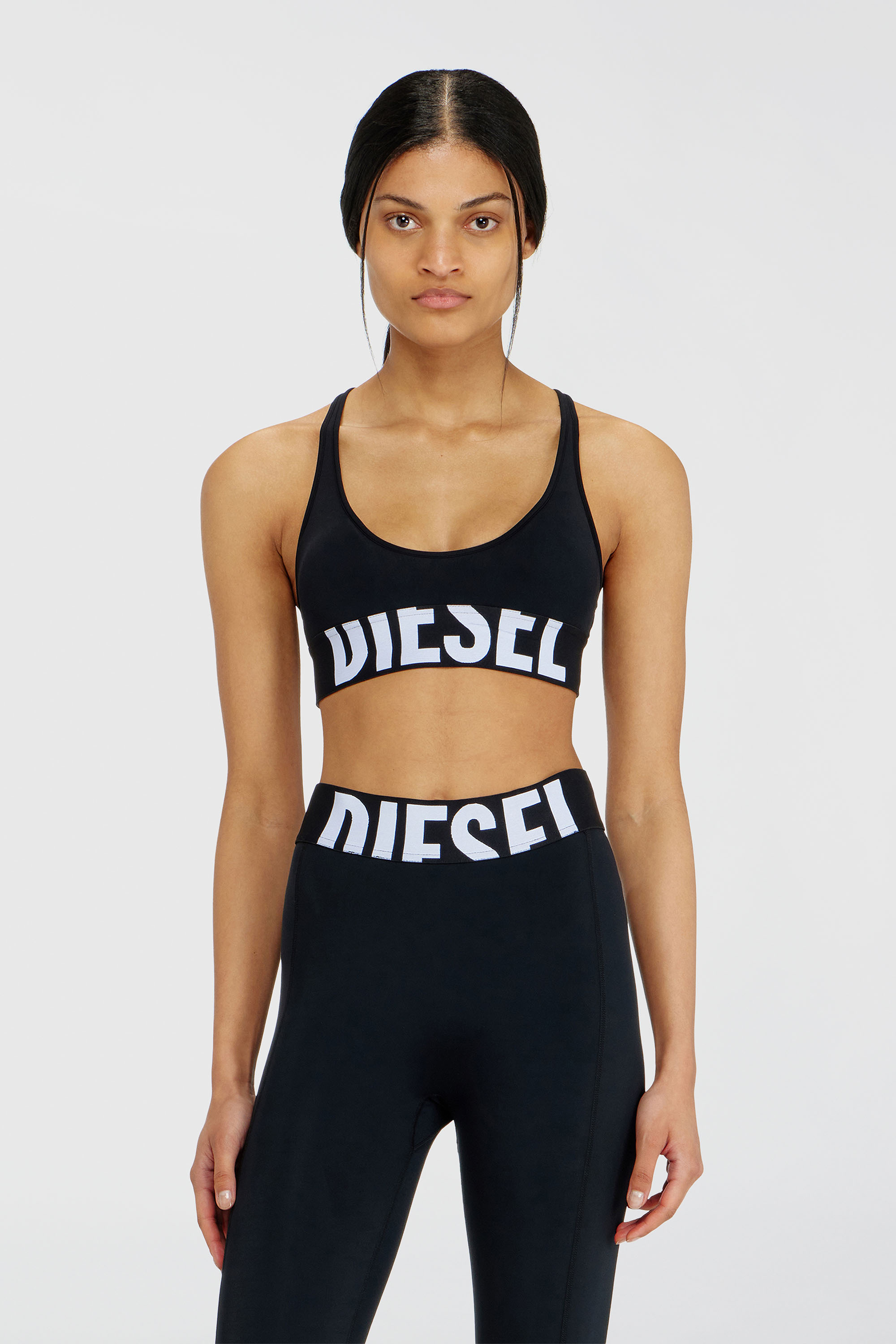 Diesel - ALLISON-D-POP, Reggiseno sportivo con logo tagliato Donna in Nero - 3