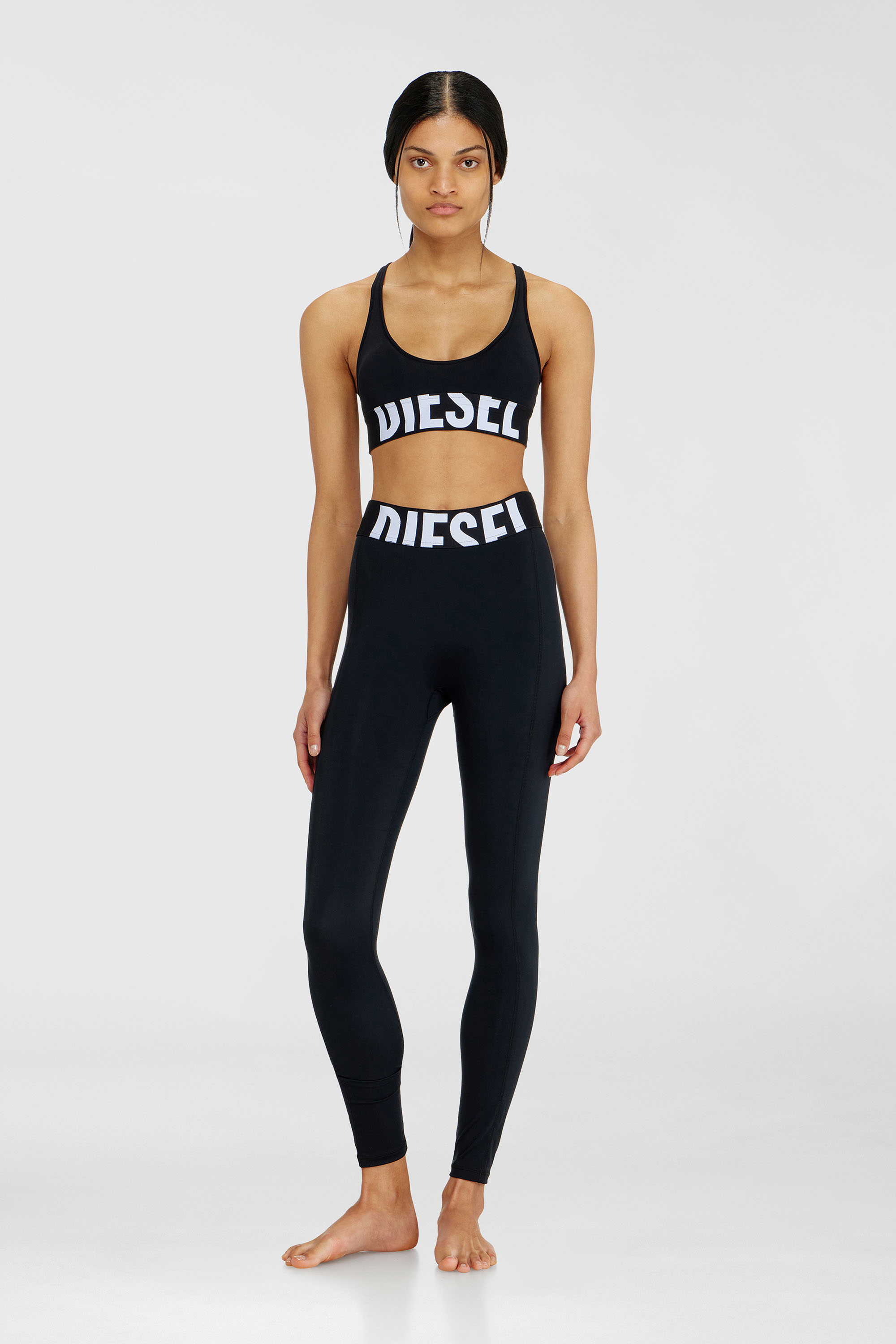 Diesel - ALLISON-D-POP, Reggiseno sportivo con logo tagliato Donna in Nero - 1