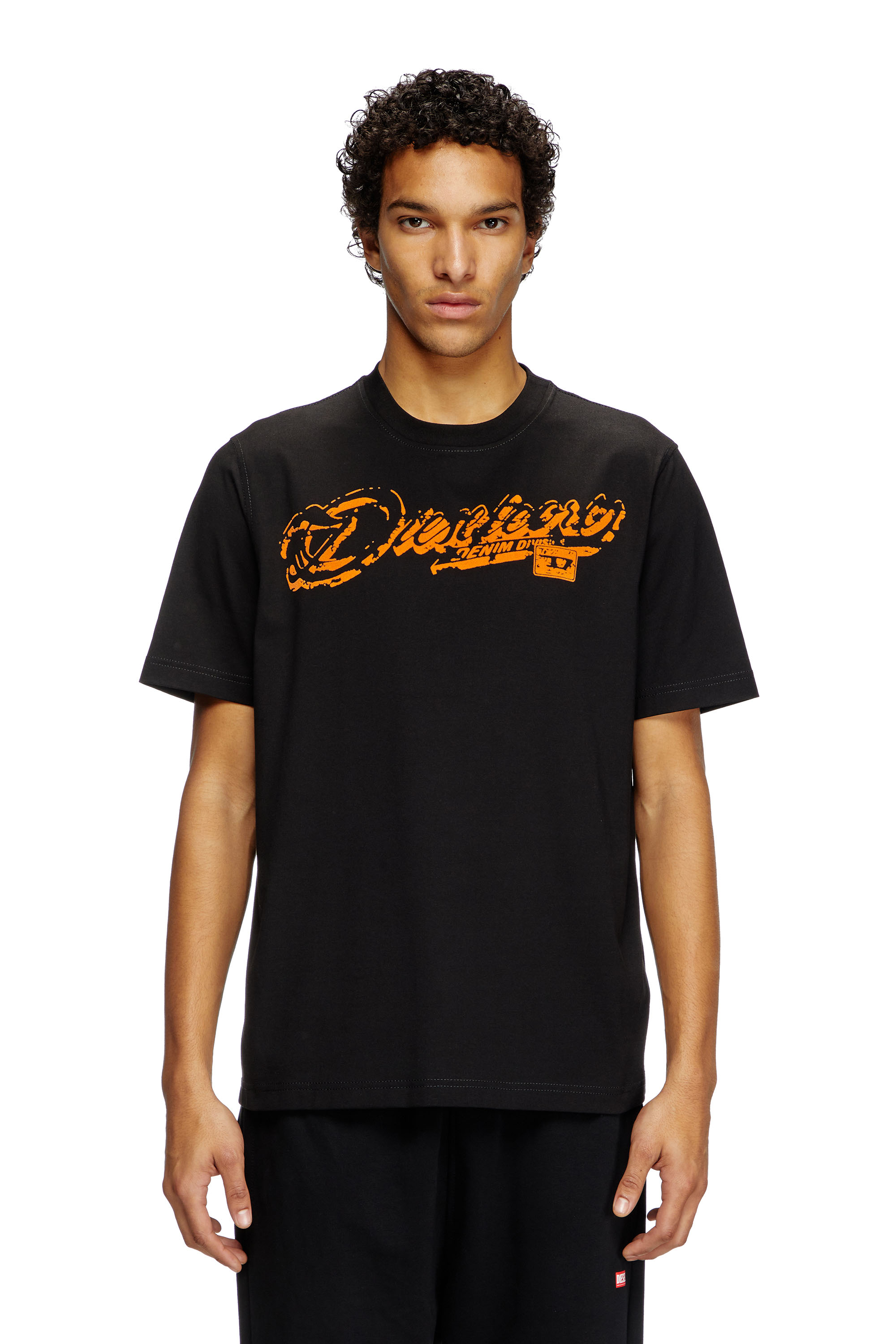 Diesel - T-ADJUST-R7, T-shirt con stampa distressed floccata Uomo in Nero - 1