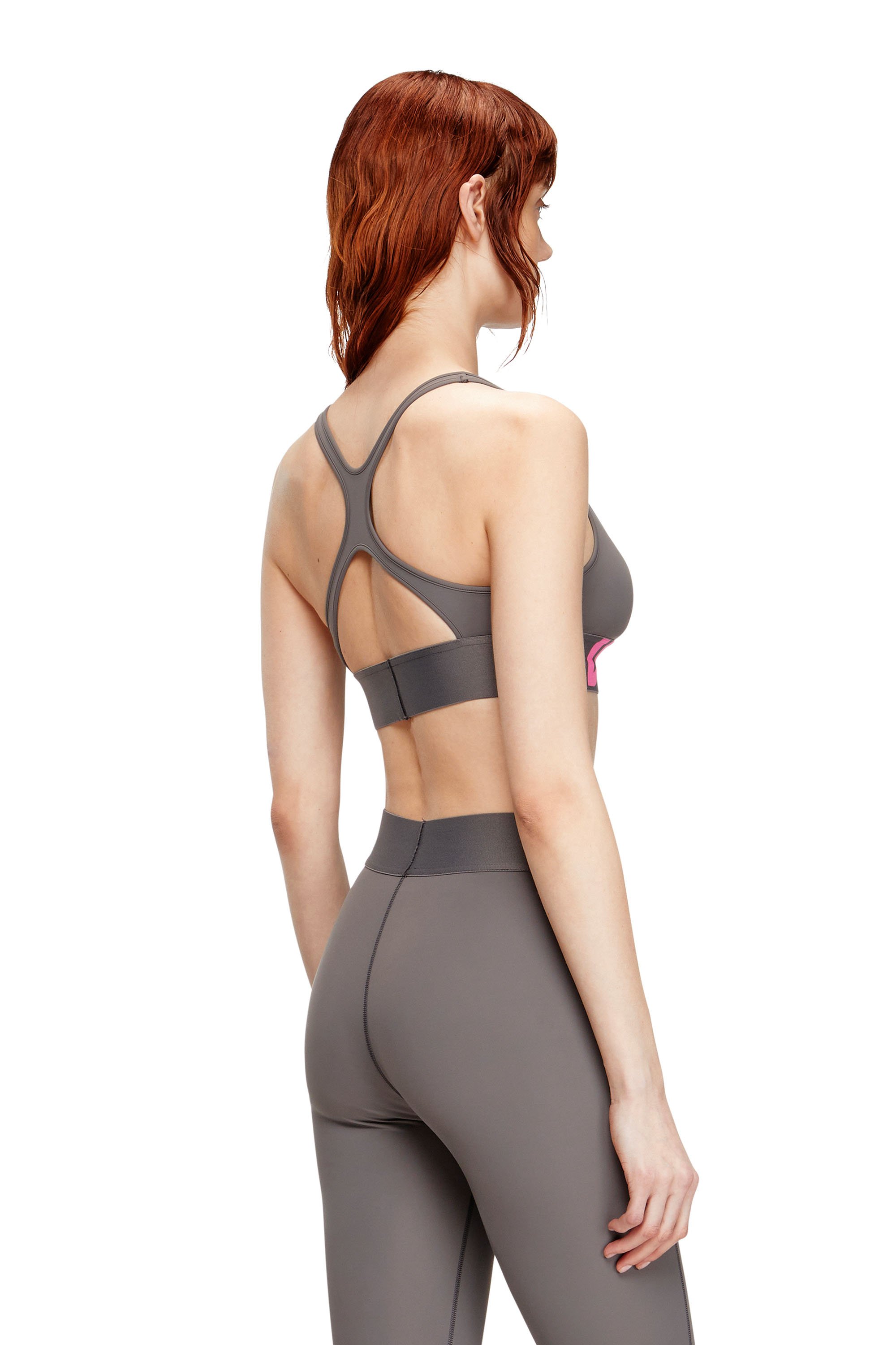 Diesel - ALLISON-D-POP, Reggiseno sportivo con logo tagliato Donna in Grigio - 4