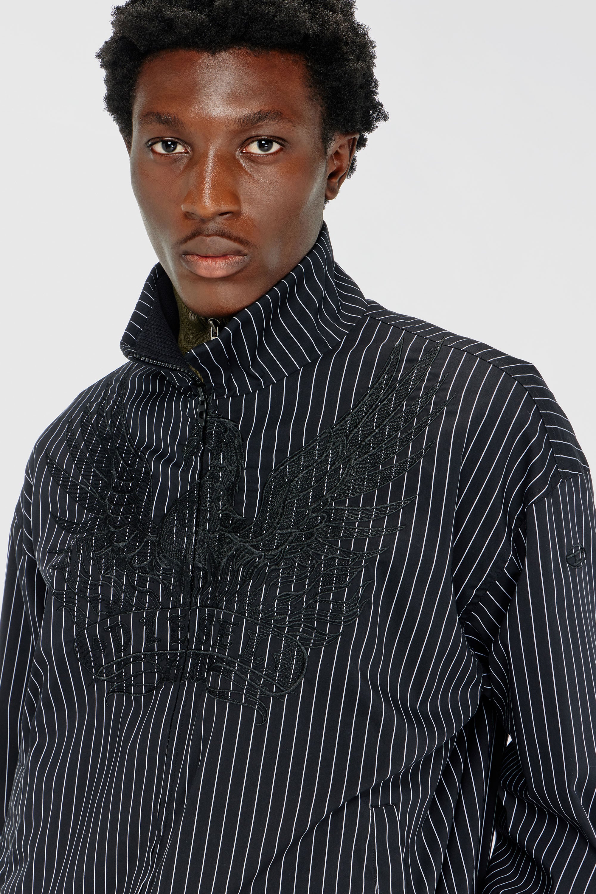 Diesel - J-CORSAR-NJCA, Giacca in nylon a righe con ricamo fenice Uomo in Nero - 5