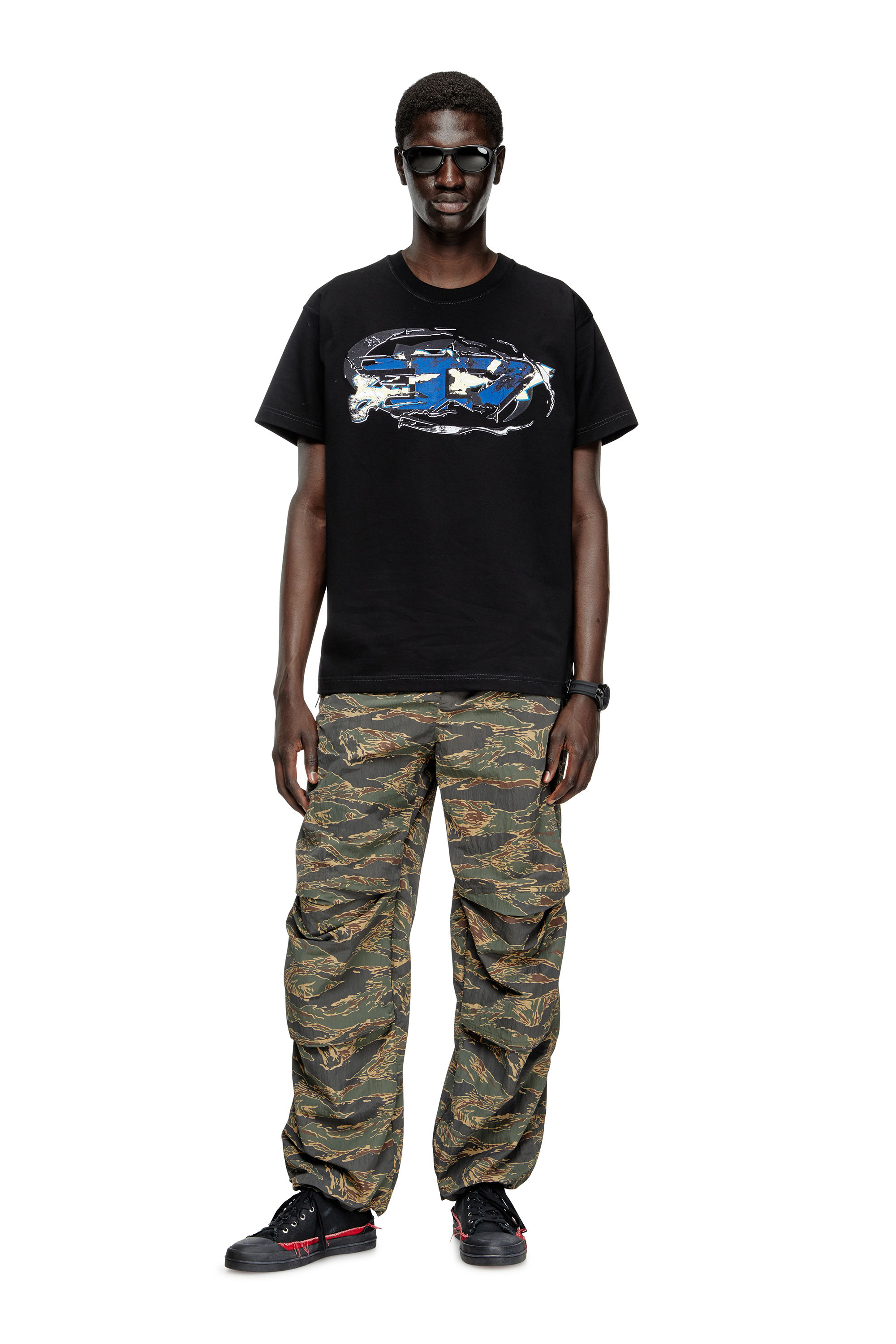 Diesel - T-NORM-T11, T-shirt con logo Oval D Uomo in Nero - 1