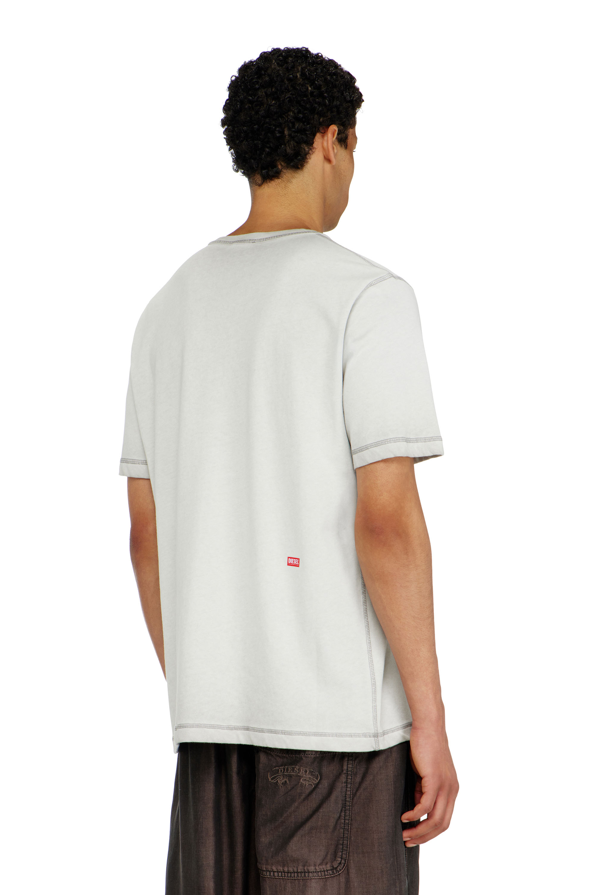 Diesel - T-RAWJUST-AA1, T-shirt in jersey con grafica in rilievo Uomo in Grigio - 4