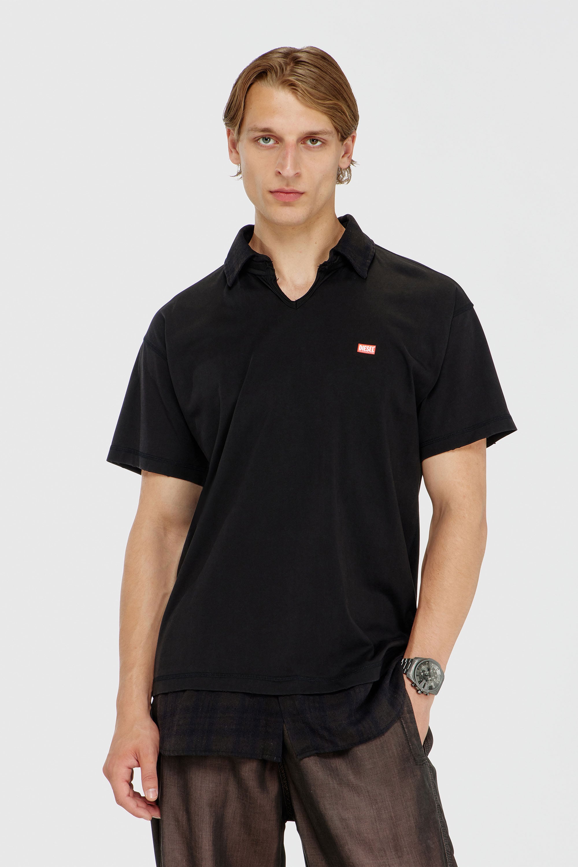 Diesel - T-ANSEL, Polo in jersey con dettagli in flanella a quadri Uomo in Nero - 1