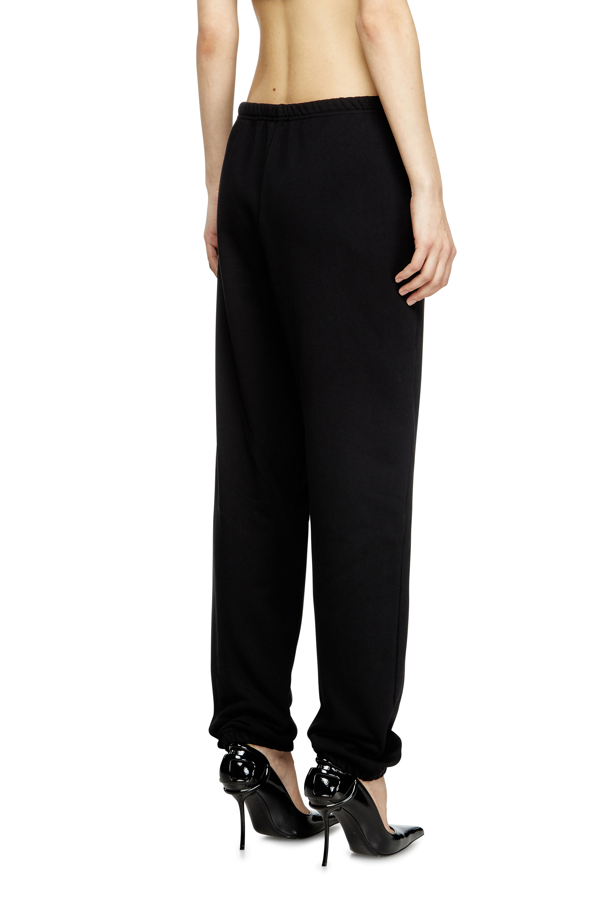 Diesel - P-LACYN-OD, Pantaloni tuta con Oval D metallizzato Donna in Nero - 4