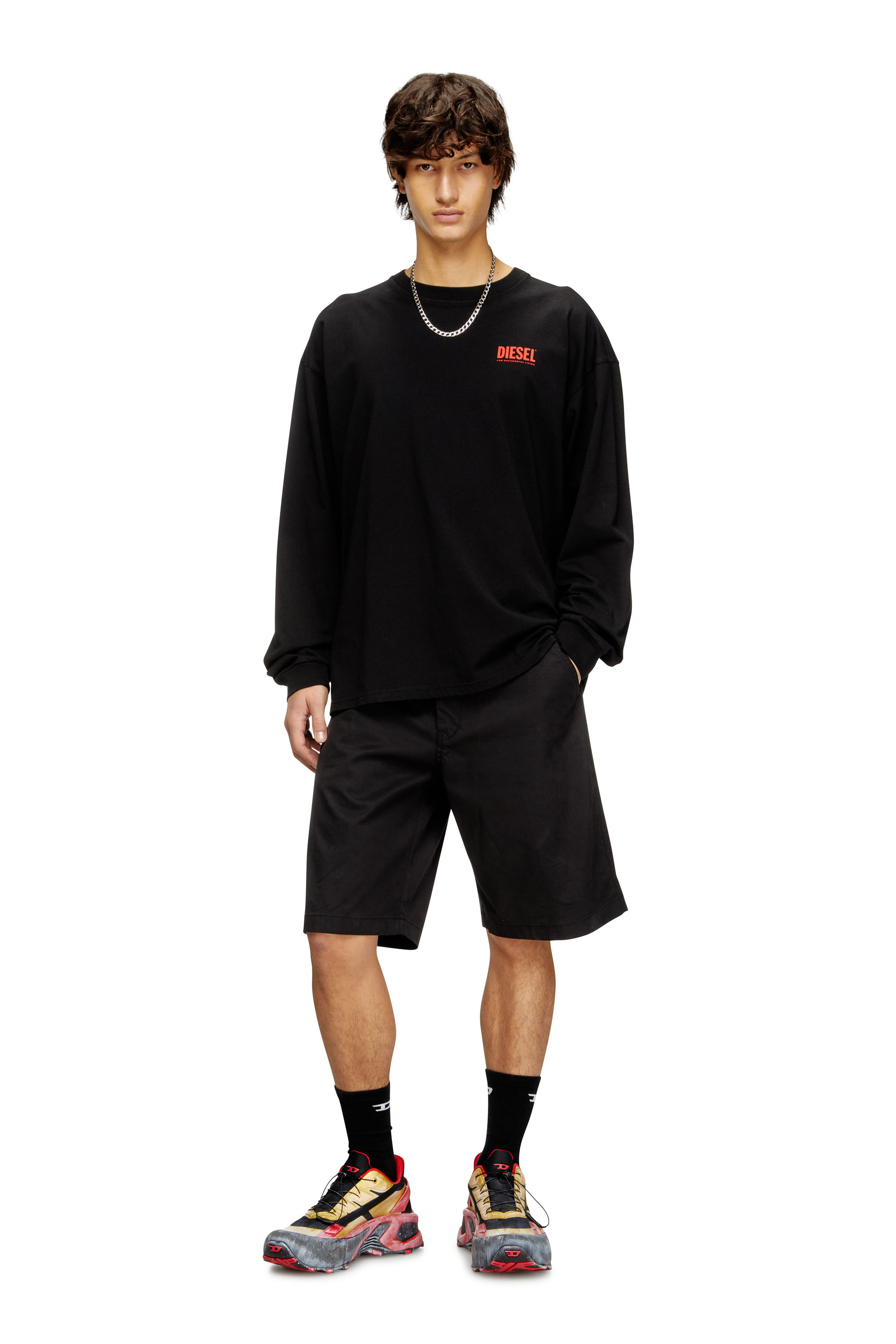 Diesel - T-BOXT-LS-BISK, T-shirt a maniche lunghe dal taglio rilassato con loghi Diesel Uomo in Nero - 1