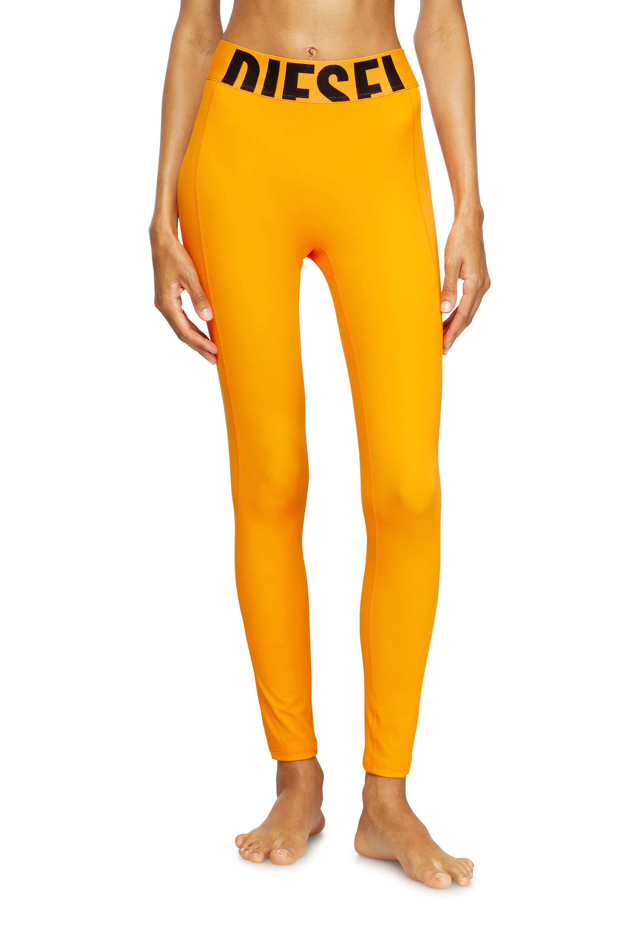 Diesel - ADELINE-D-POP, Leggings in microfibra con logo tagliato Donna in Arancione - 2