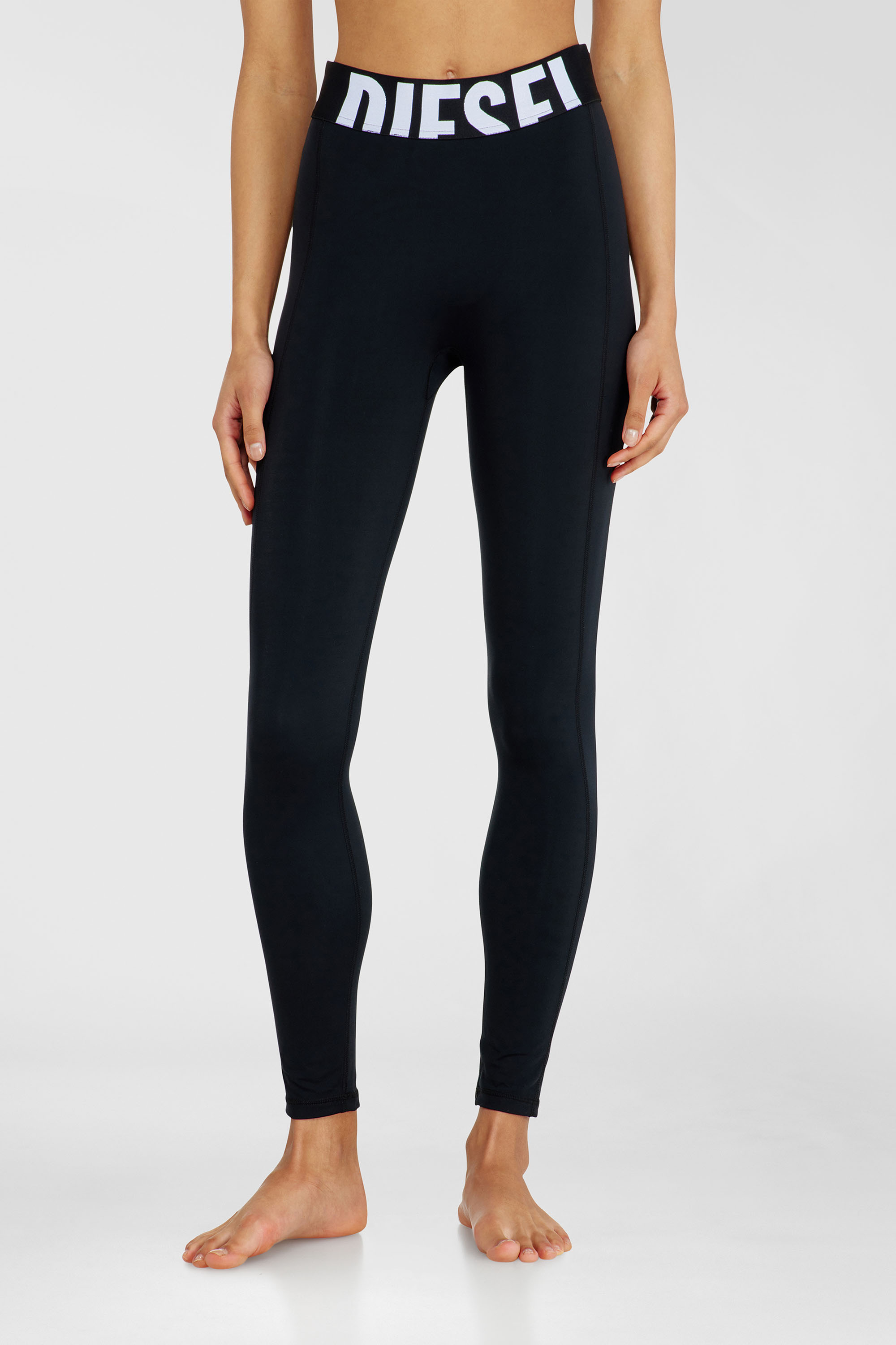 Diesel - ADELINE-D-POP, Leggings in microfibra con logo tagliato Donna in Nero - 1