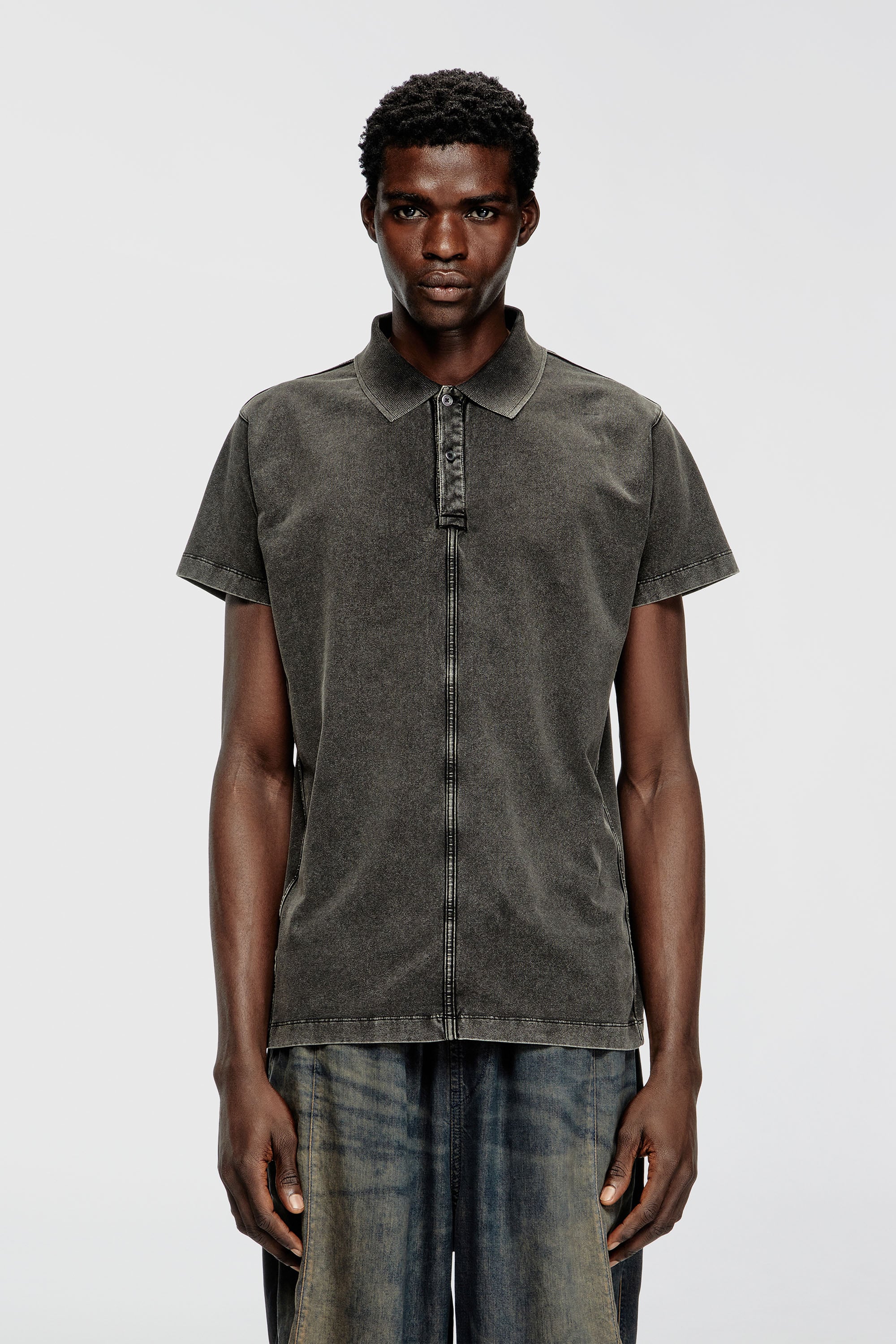 Diesel - T-NOMELY, Polo in jersey effetto denim Uomo in Nero - 1