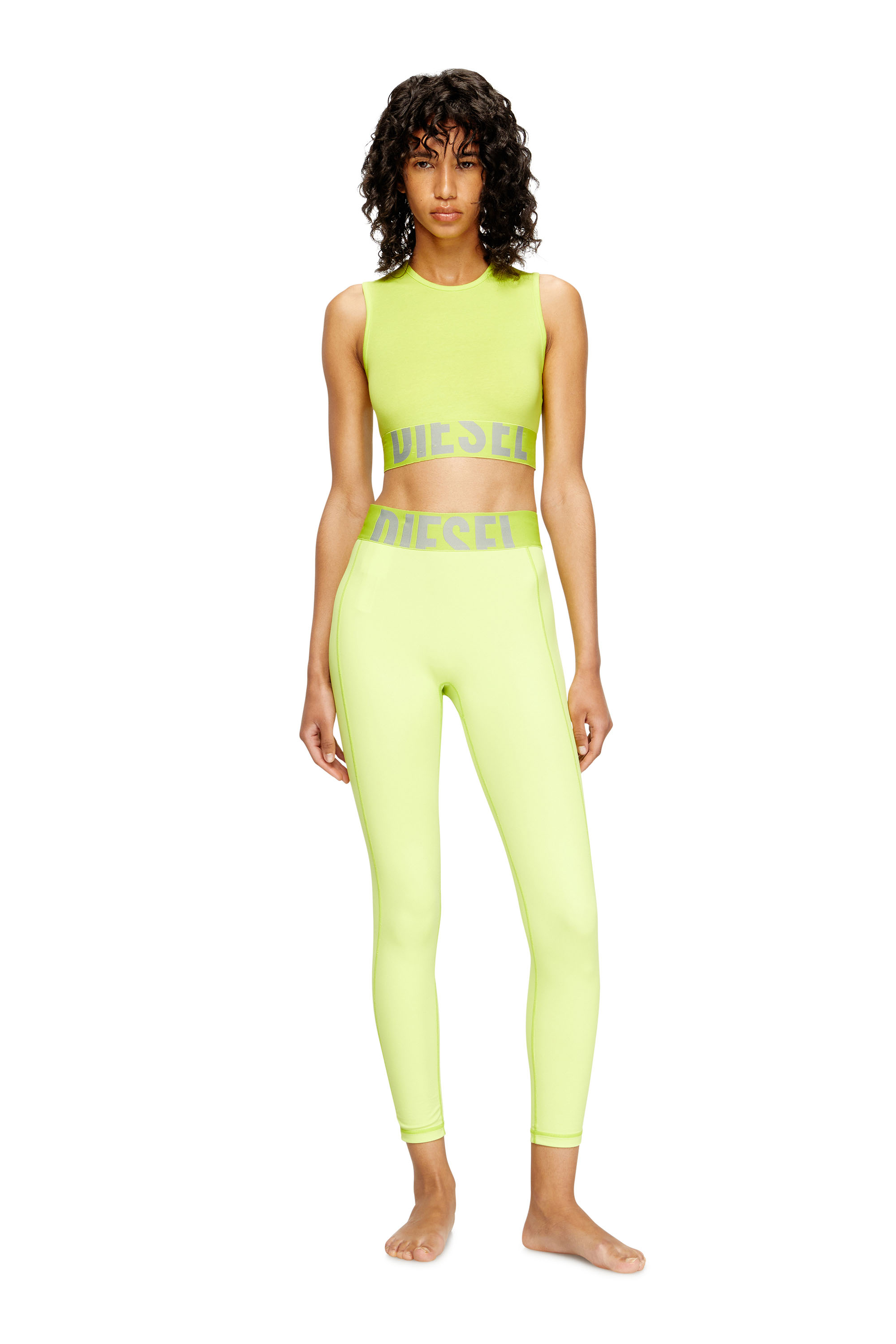Diesel - ADELINE-D-POP, Leggings in microfibra con logo tagliato Donna in Verde - 1