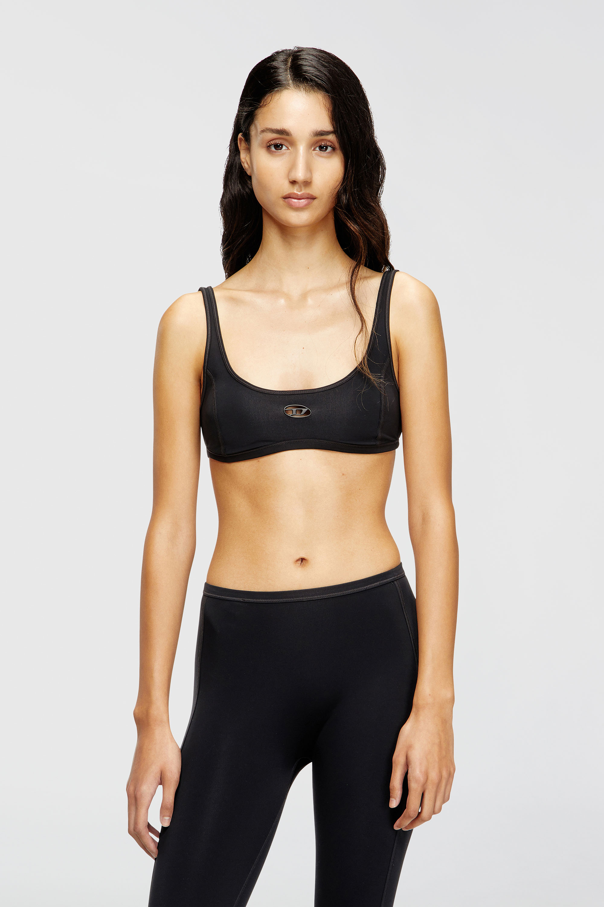 Diesel - CHELSEA-UTLT, Reggiseno sportivo con logo cut-out Donna in Nero - 1