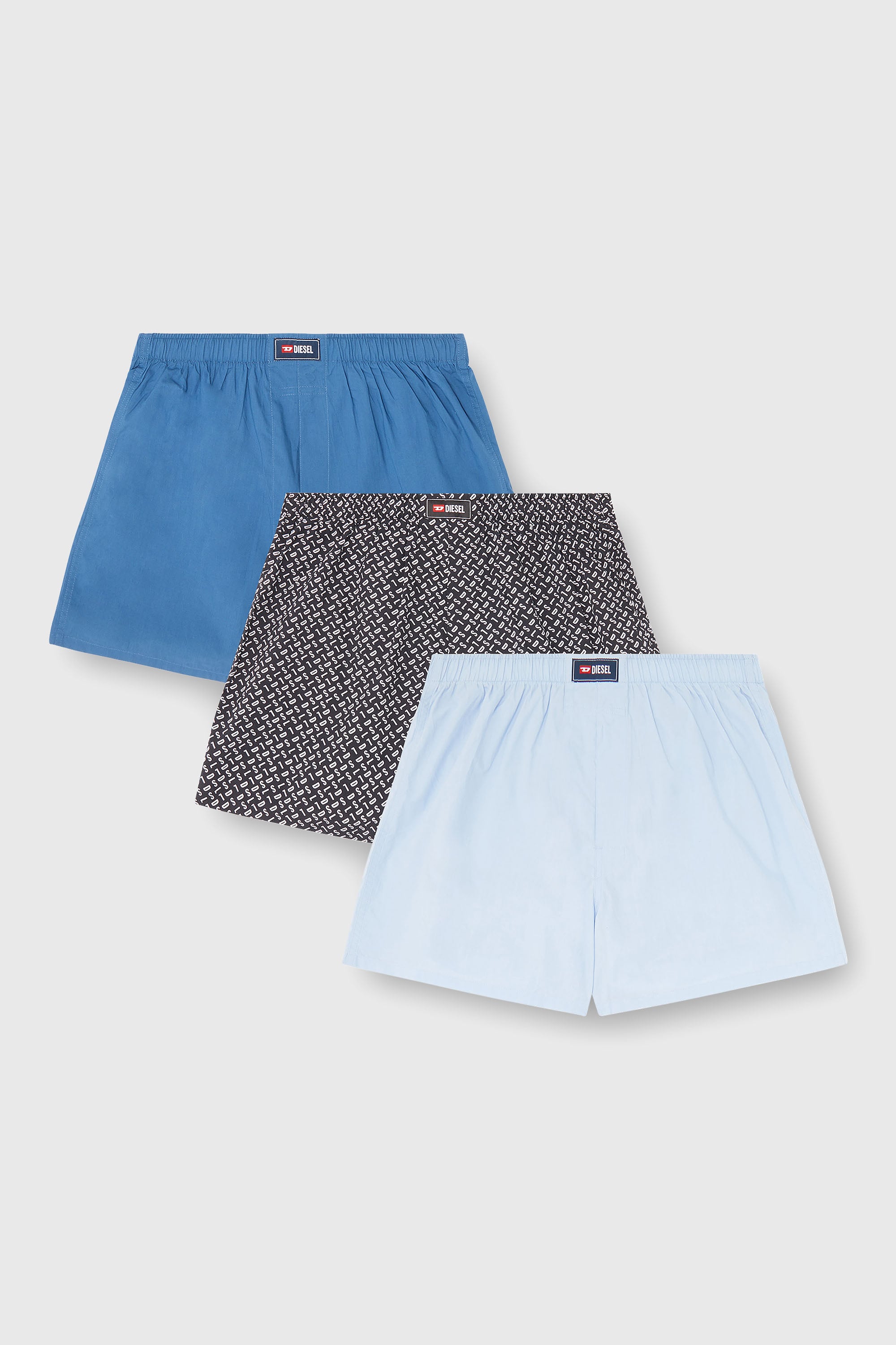 Diesel - RYAN-D-CORE-3PACK, Set da tre paia boxer lungo in cotone, tinta unita e stampa all-over DSL Uomo in Blu - 1