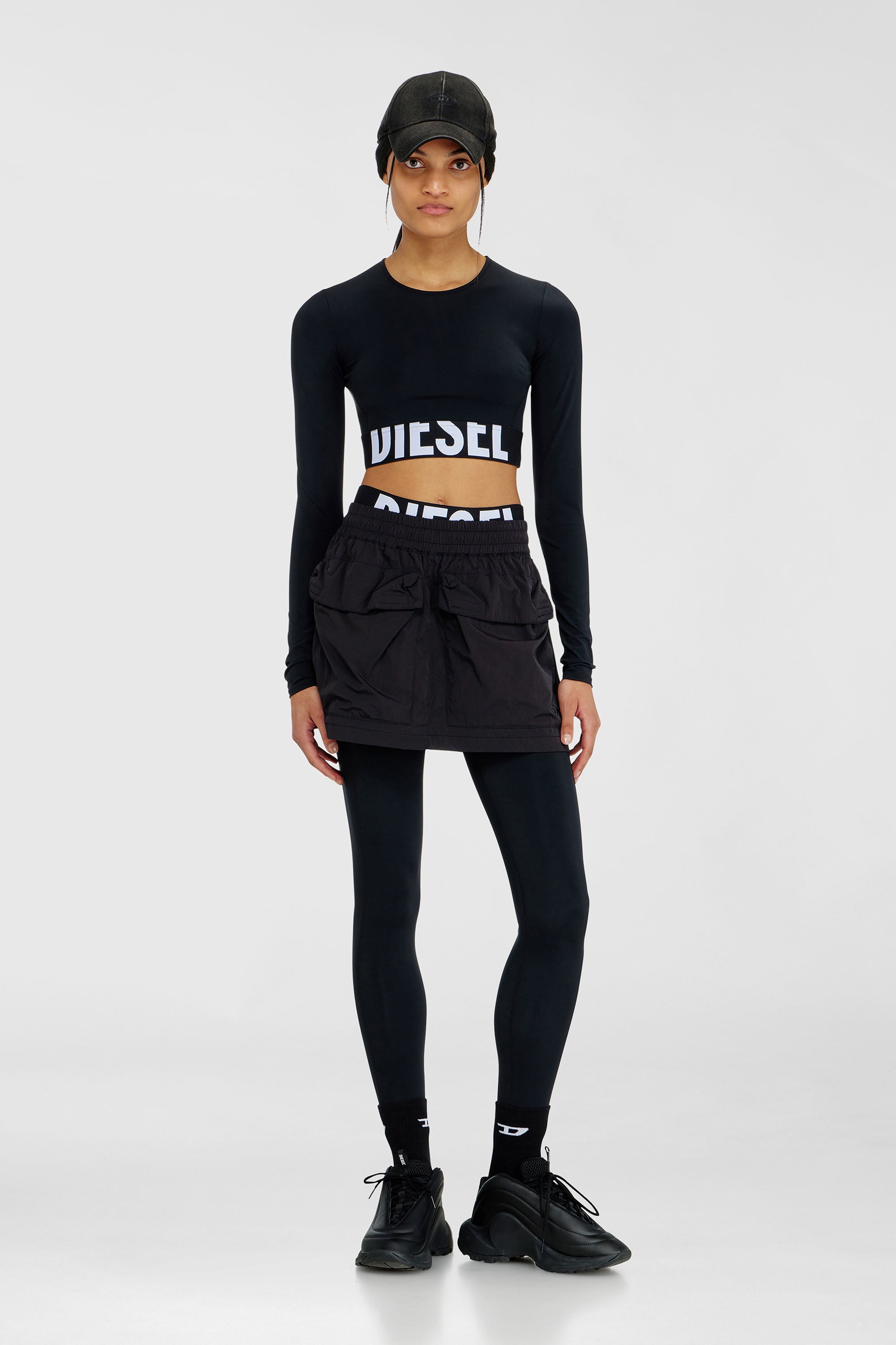 Diesel - ADELINE-D-POP, Leggings in microfibra con logo tagliato Donna in Nero - 5