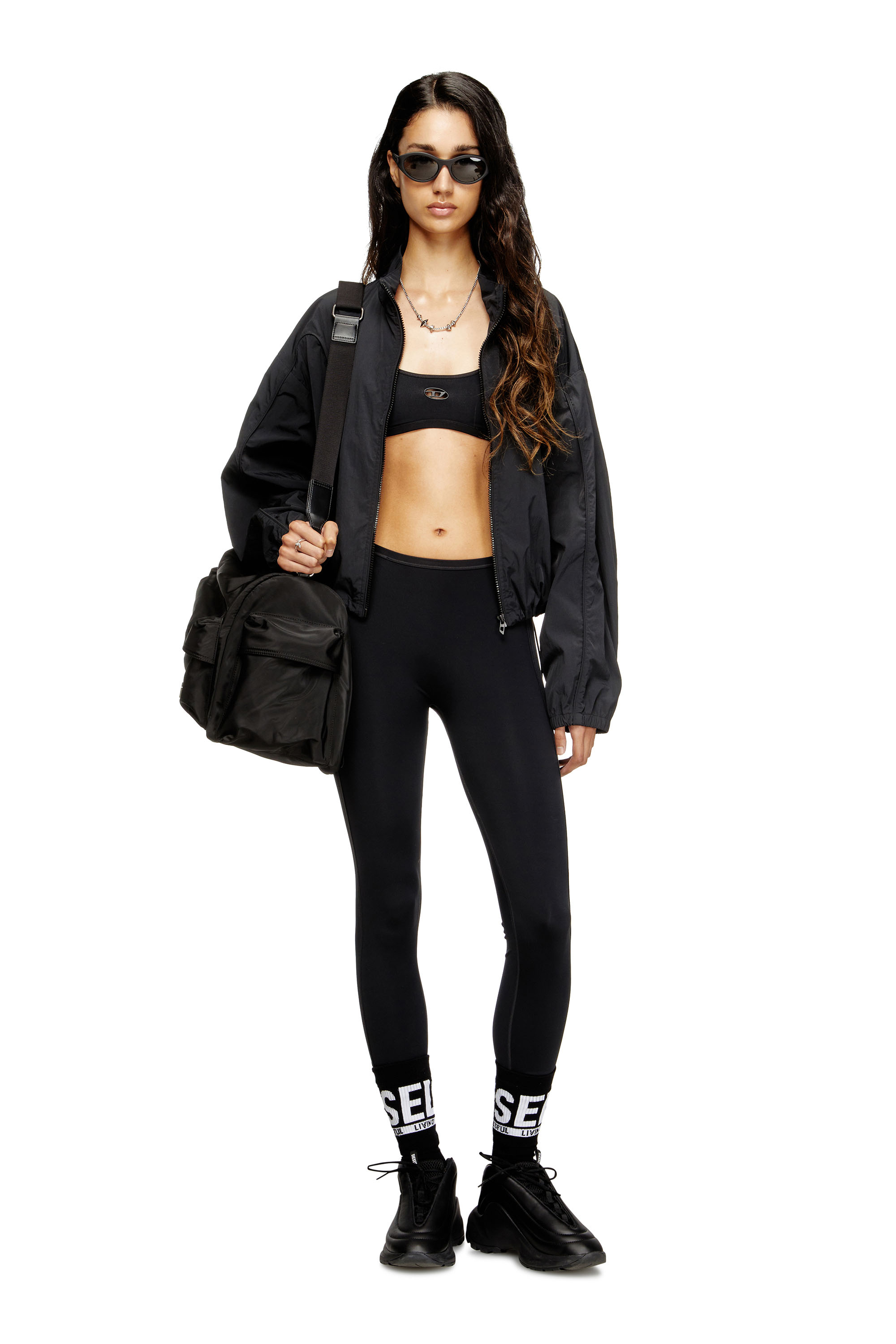 Diesel - CHELSEA-UTLT, Reggiseno sportivo con logo cut-out Donna in Nero - 4